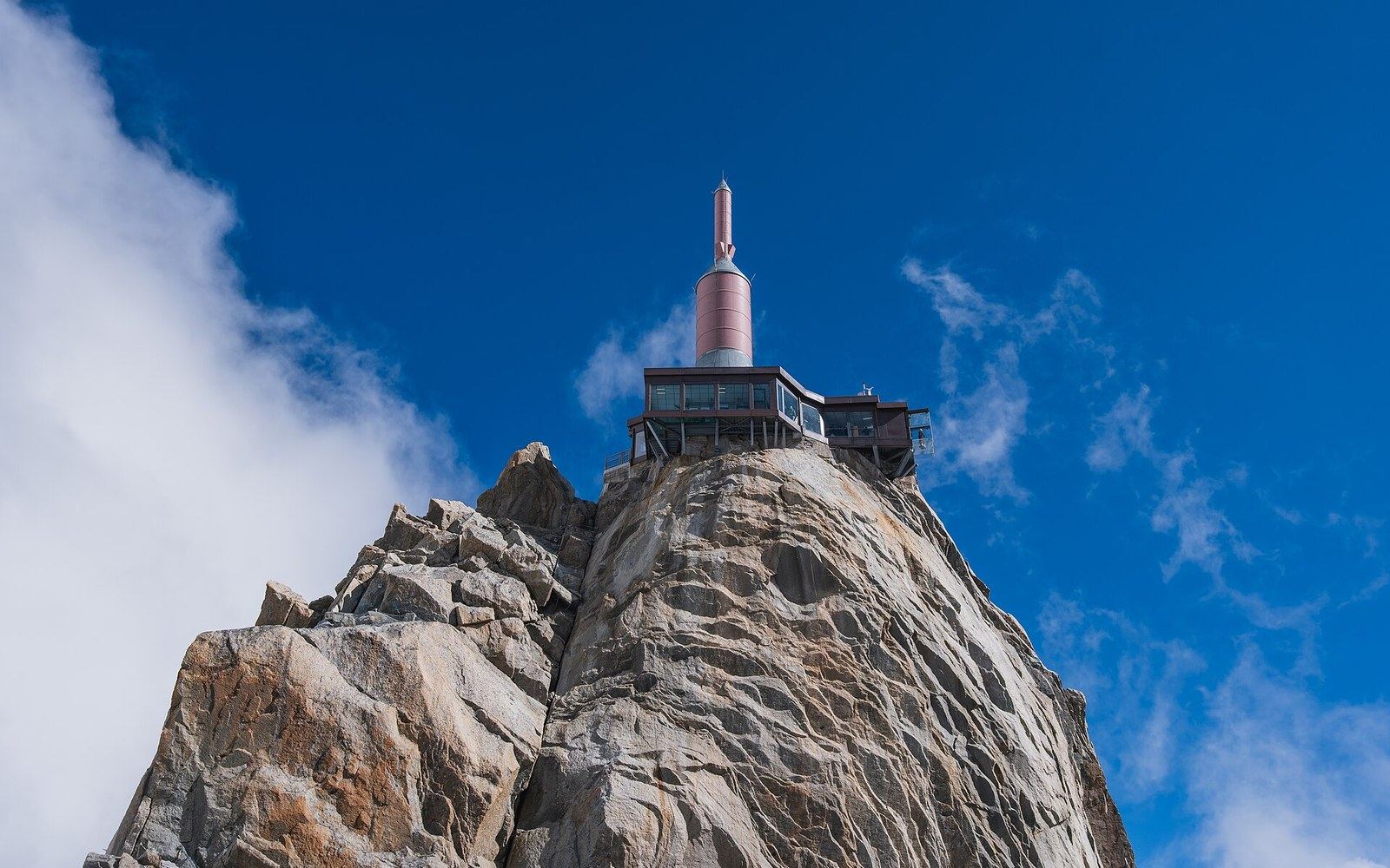 Observation deck and antenna tower perched atop the rocky Aiguille du Midi summit